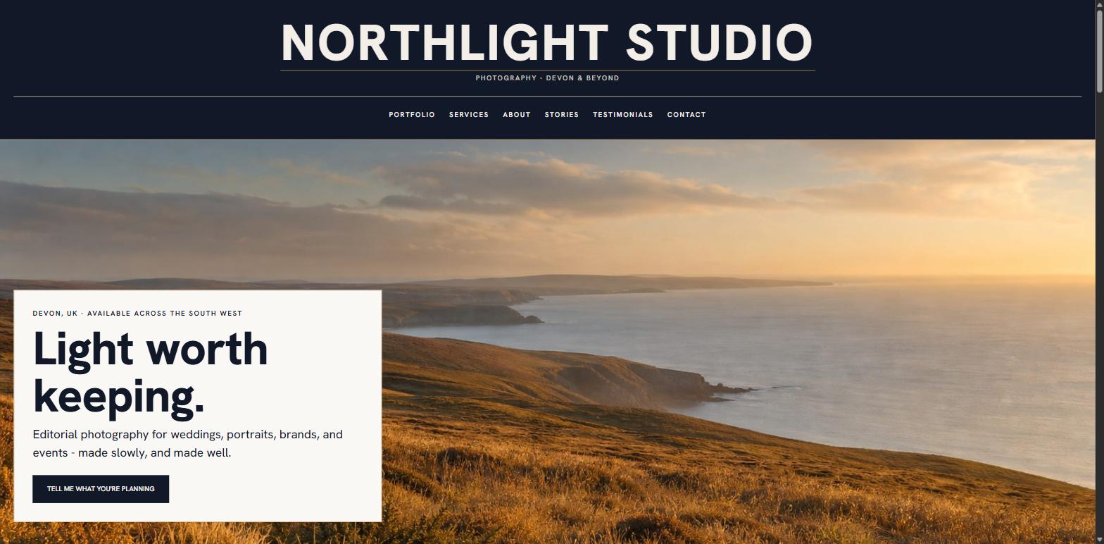 The Northlight Studio homepage: a wide Devon coastal landscape at golden hour, with an offset bone-coloured panel carrying the headline 'Light worth keeping'.